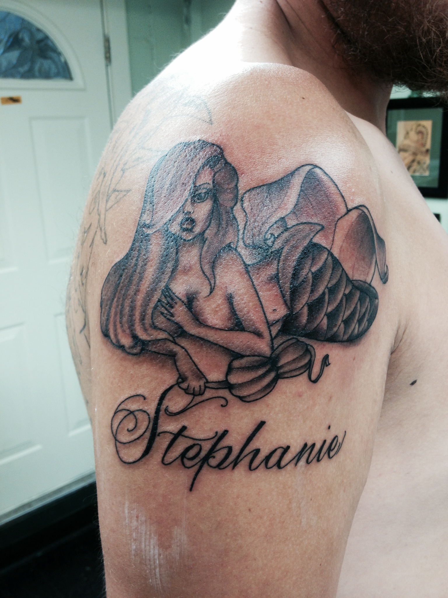 Kirby_blackandgrey_mermaid_script_lark_tattoo_albany_ny