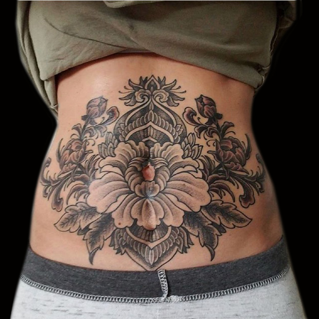 flower tattoo stomach